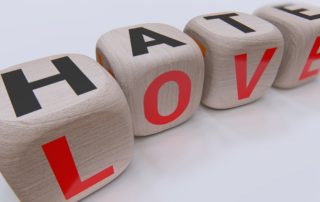 Hate and Love spelled out on blocks